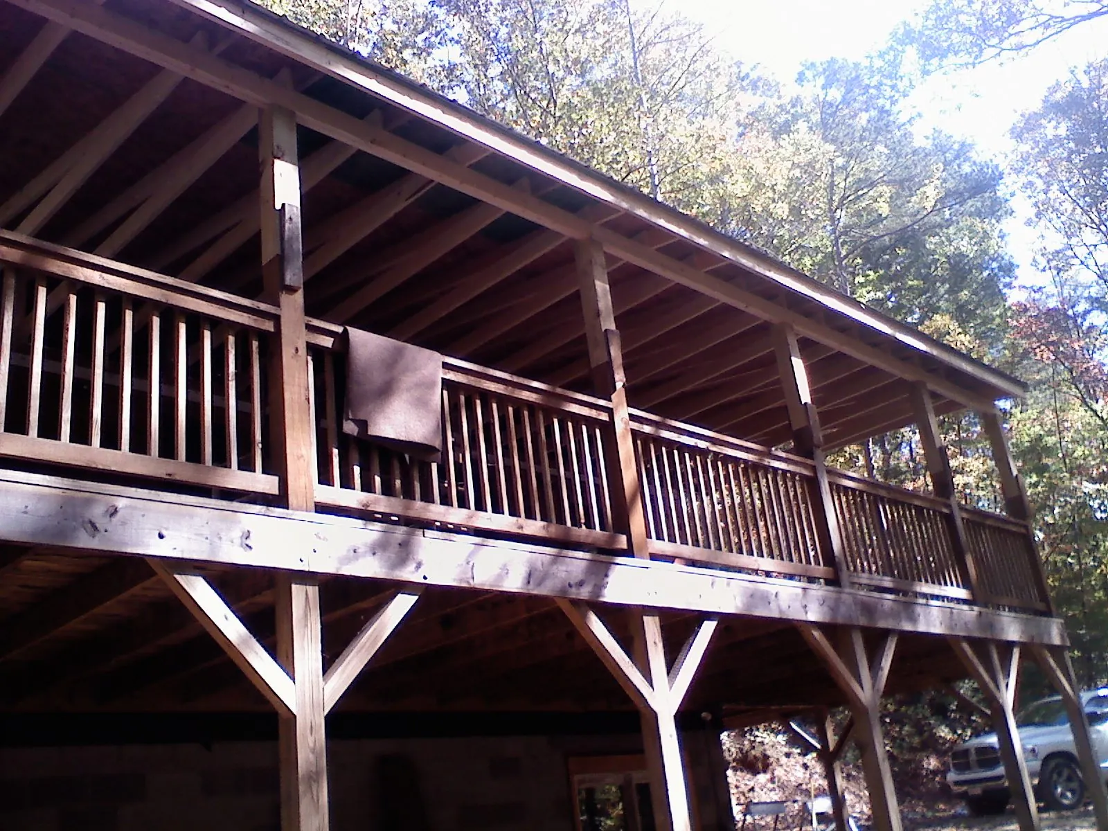 Timber framing under a new elevated porch and deck — Roof Leak Repair in Inman by Roofing Brothers